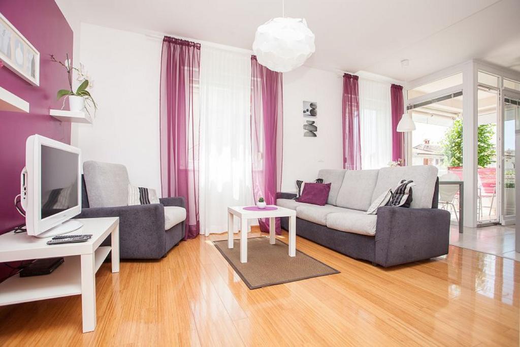 Kuvi Apartments Ровинь Номер фото